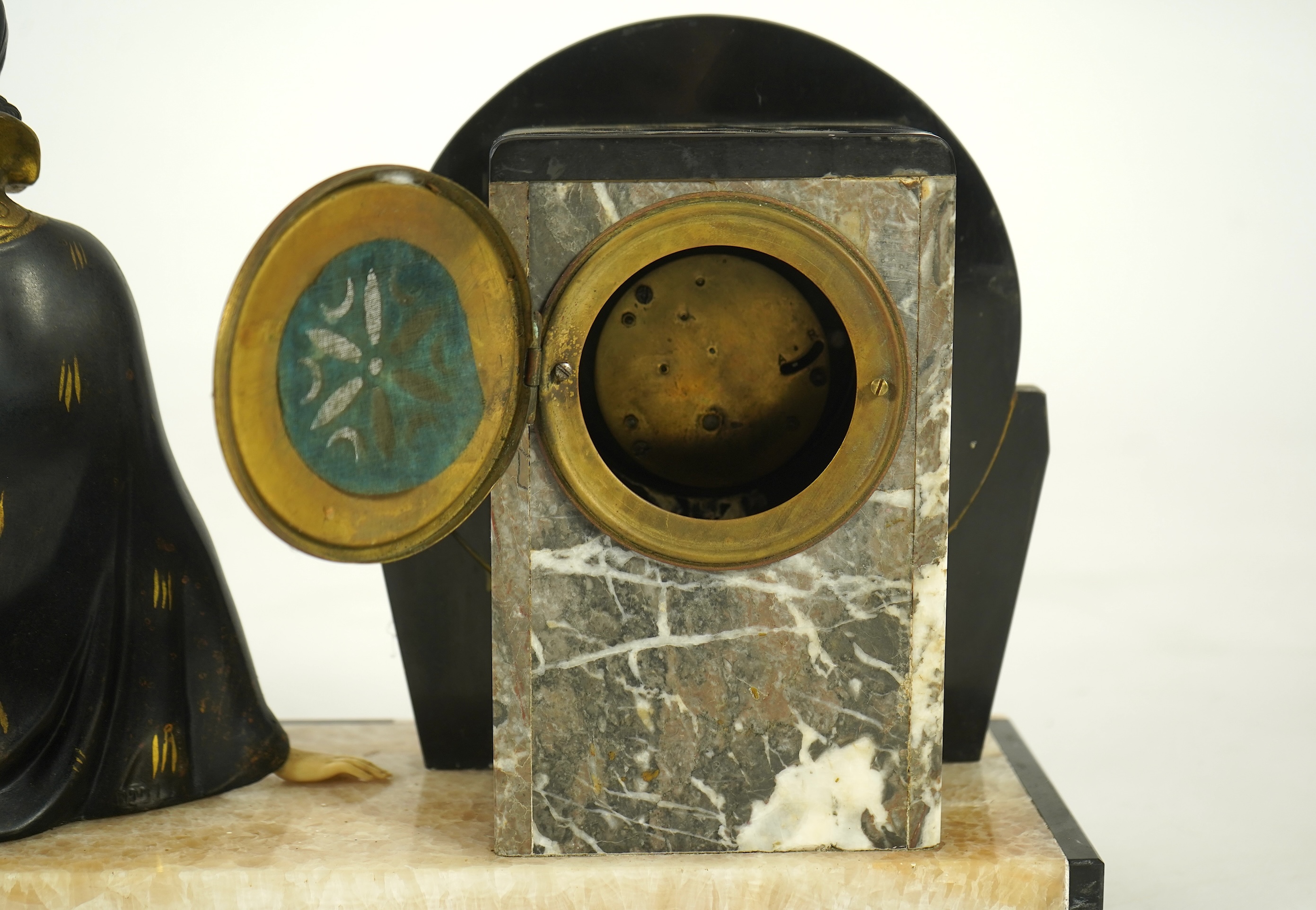 Attributed to Uriano (Ugo Cipriani, Italian, 1897-1960), a French Art Deco marble clock garniture